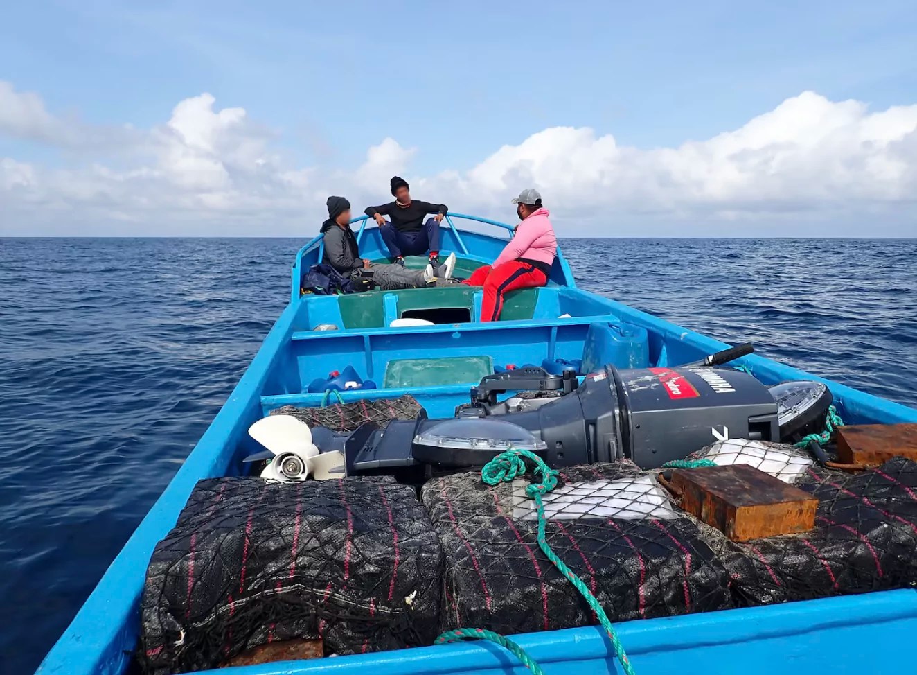 Suspected drug smugglers and the drugs being transported on board were recently seized by the Coast Guard. (Courtesy image: U.S. Coast Guard) 